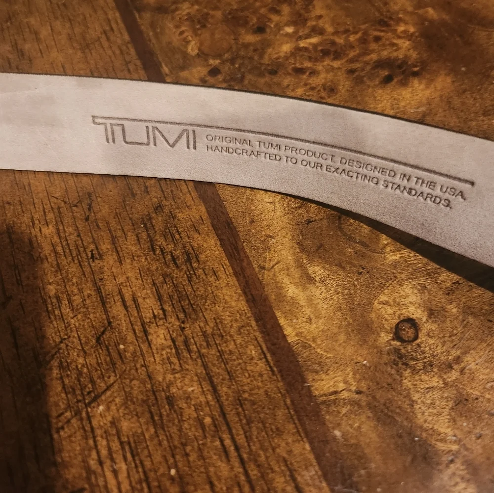 Tumi leather belt